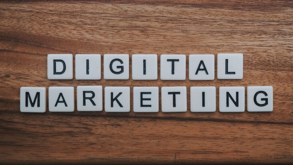 digital marketing artwork on a brown wooden surface