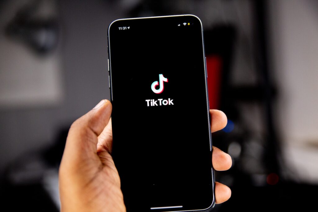 a person using TikTok on a phone
